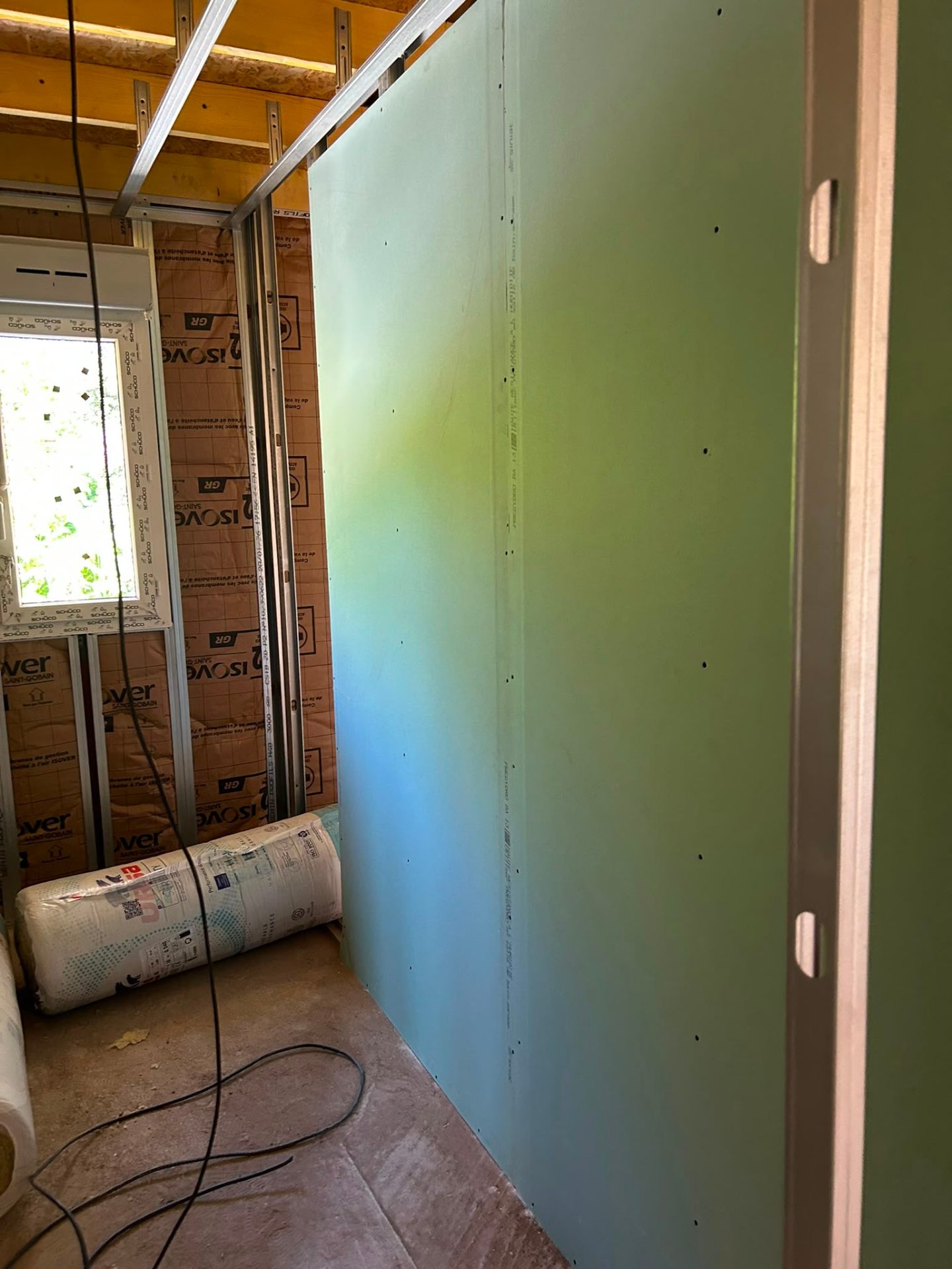 Construction — Cloison hydrofuge sur ossature